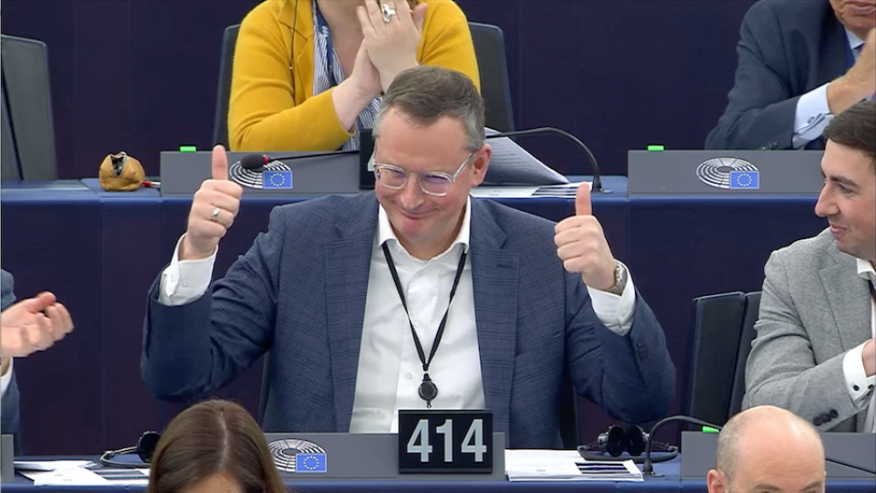 Stefan Berger, MiCA rapporteur celebrates the adoption of his report in Strasbourg.